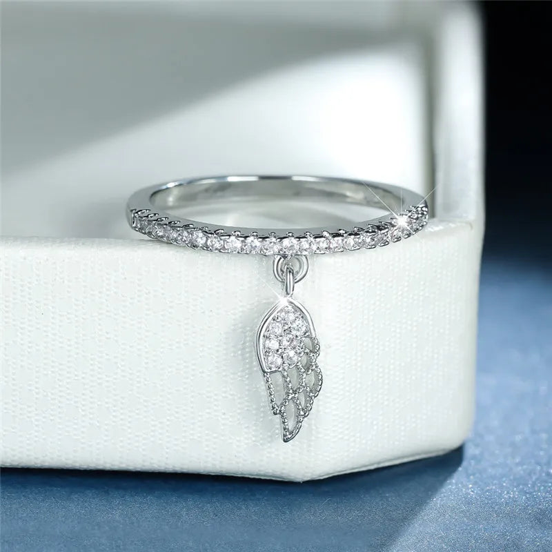 Ring met hanger in engelenvleugels van zilver