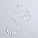 Halsketting met grote hanger in de vorm van engelenvleugels in zilver