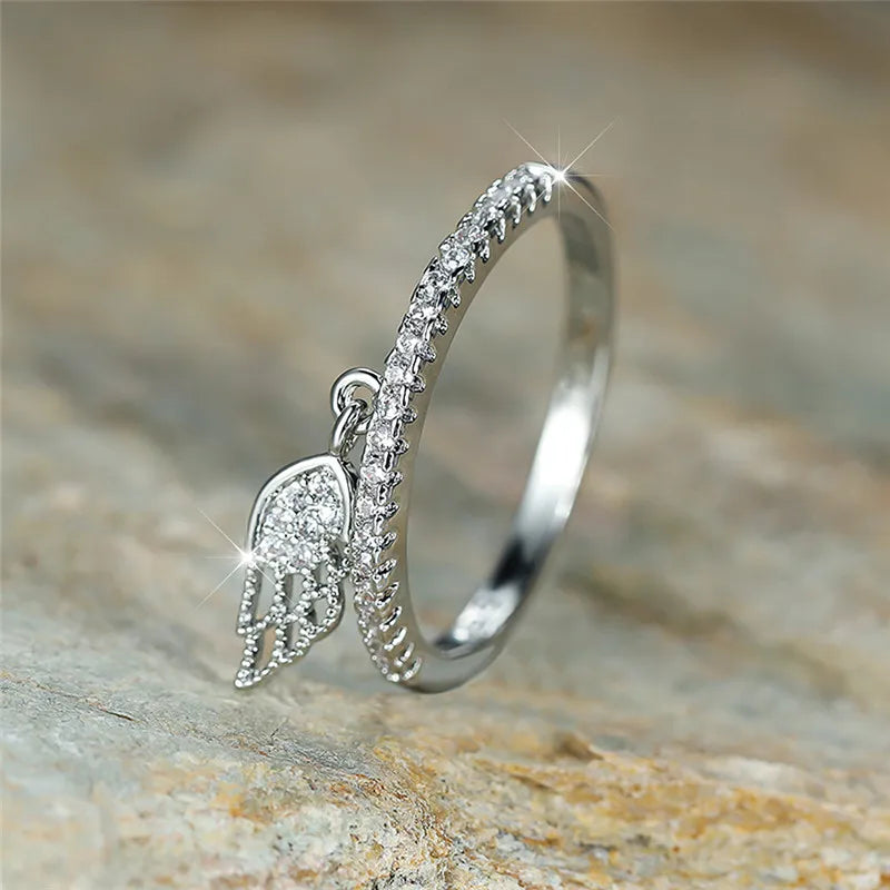 Ring met hanger in engelenvleugels van zilver