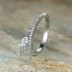 Ring met hanger in engelenvleugels van zilver