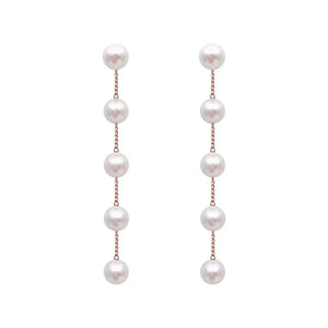 Boucles d'Oreilles Pendantes avec Perles Blanches