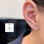 Witte engelenvleugel oorbellen