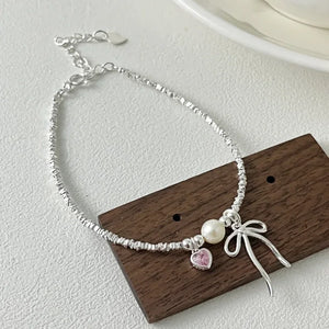 Bracelet Gourmette Noeud de Papillon et Perle