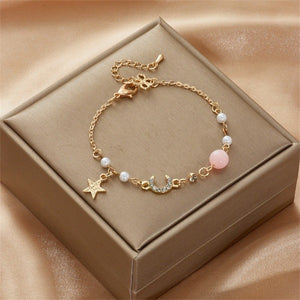 Bracelet Lune et Étoile Femme Gourmette Astres rose