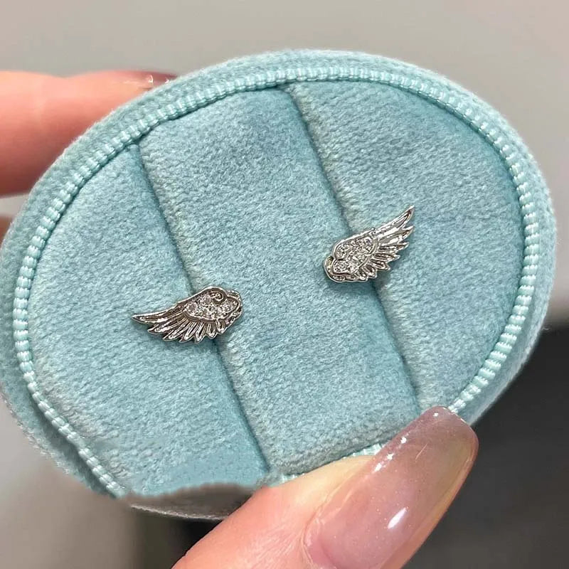 Witte engelenvleugel oorbellen