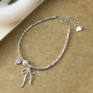 Bracelet Gourmette Noeud de Papillon et Perle