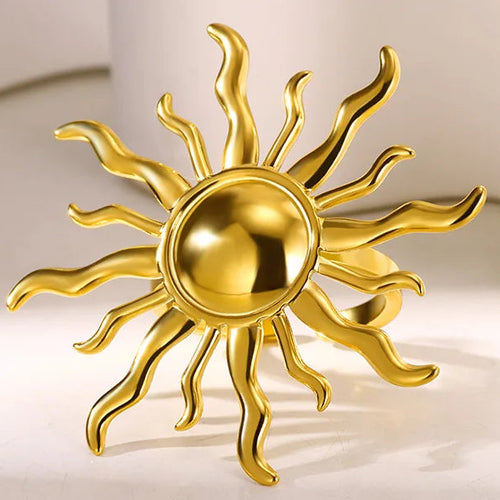 Verstelbare ring met grote zon en golvende stralen