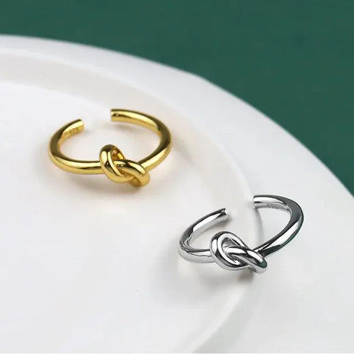 Verstelbare ring met gouden knoop