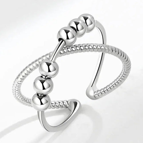 Anti-stressring in futuristische stijl met draaiende kralen
