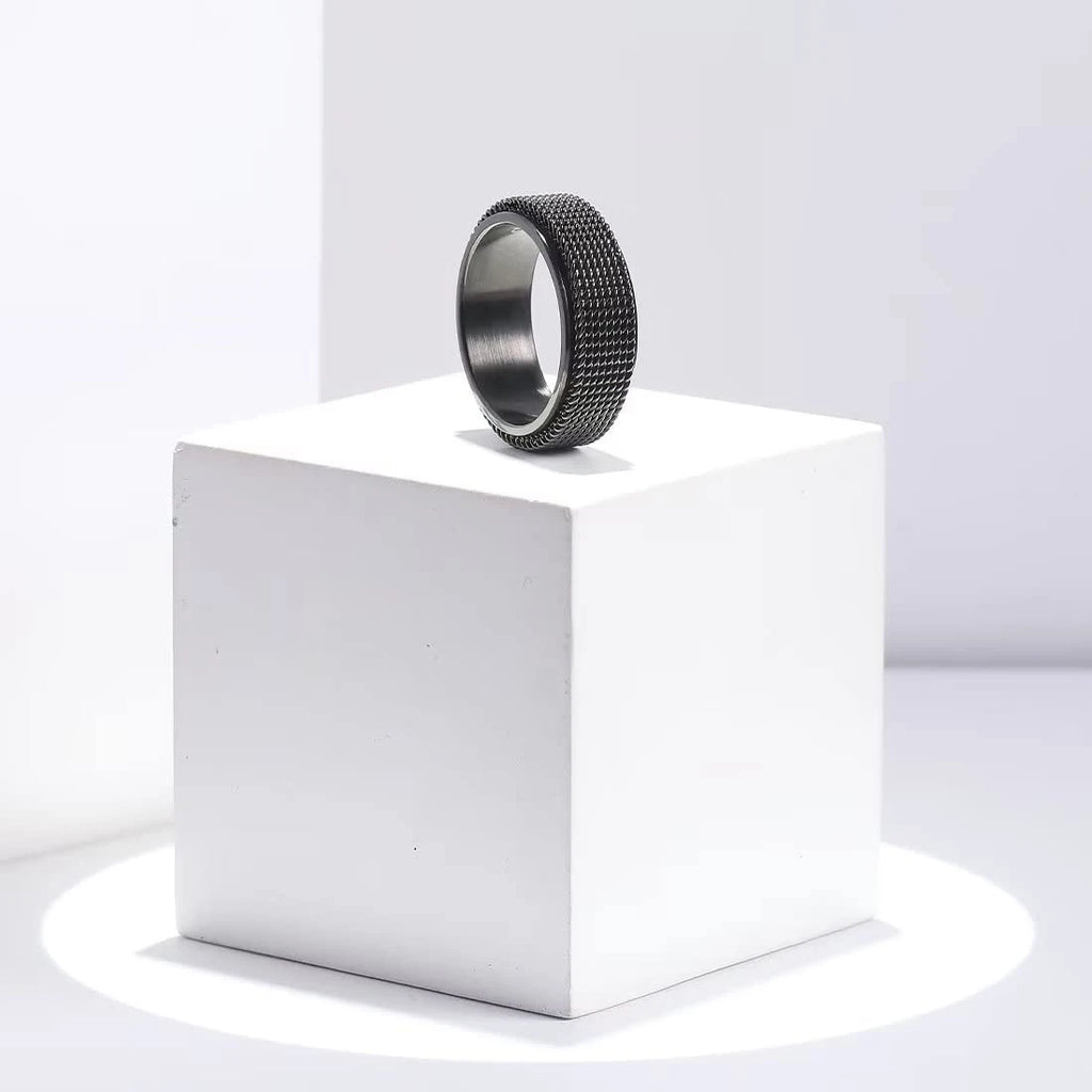 Bague anti-stress rotative à motif torsadé noir