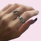 Ring met opengewerkte zilveren kruis