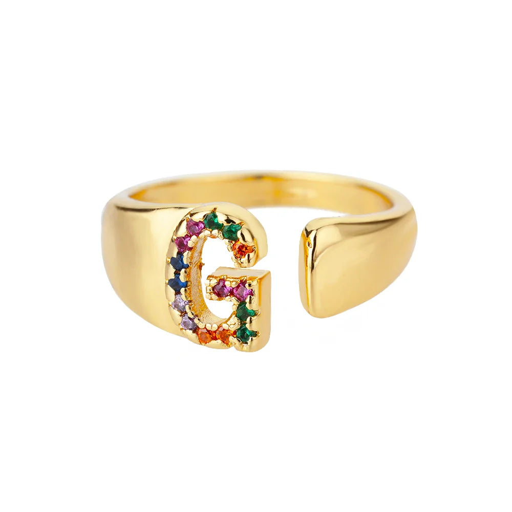 Brede gepersonaliseerde ring met regenbooginitiaal g