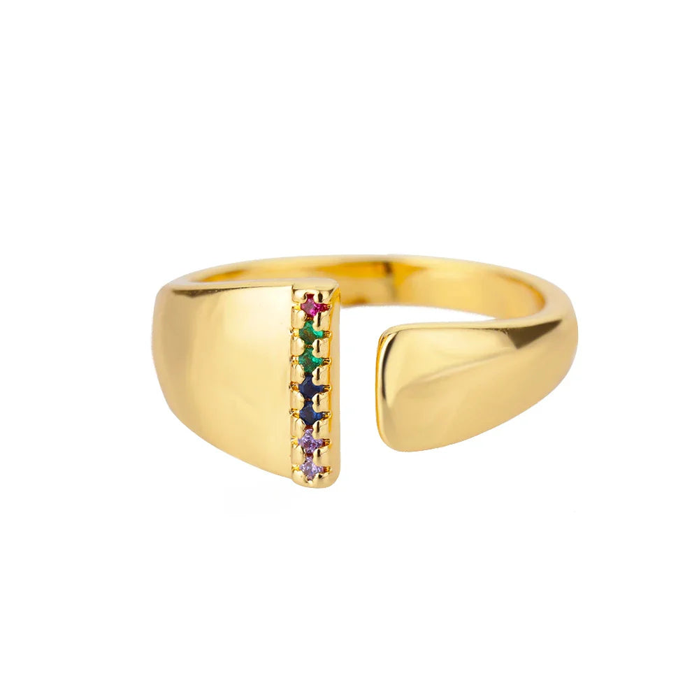 Brede gepersonaliseerde ring met regenbooginitiaal i
