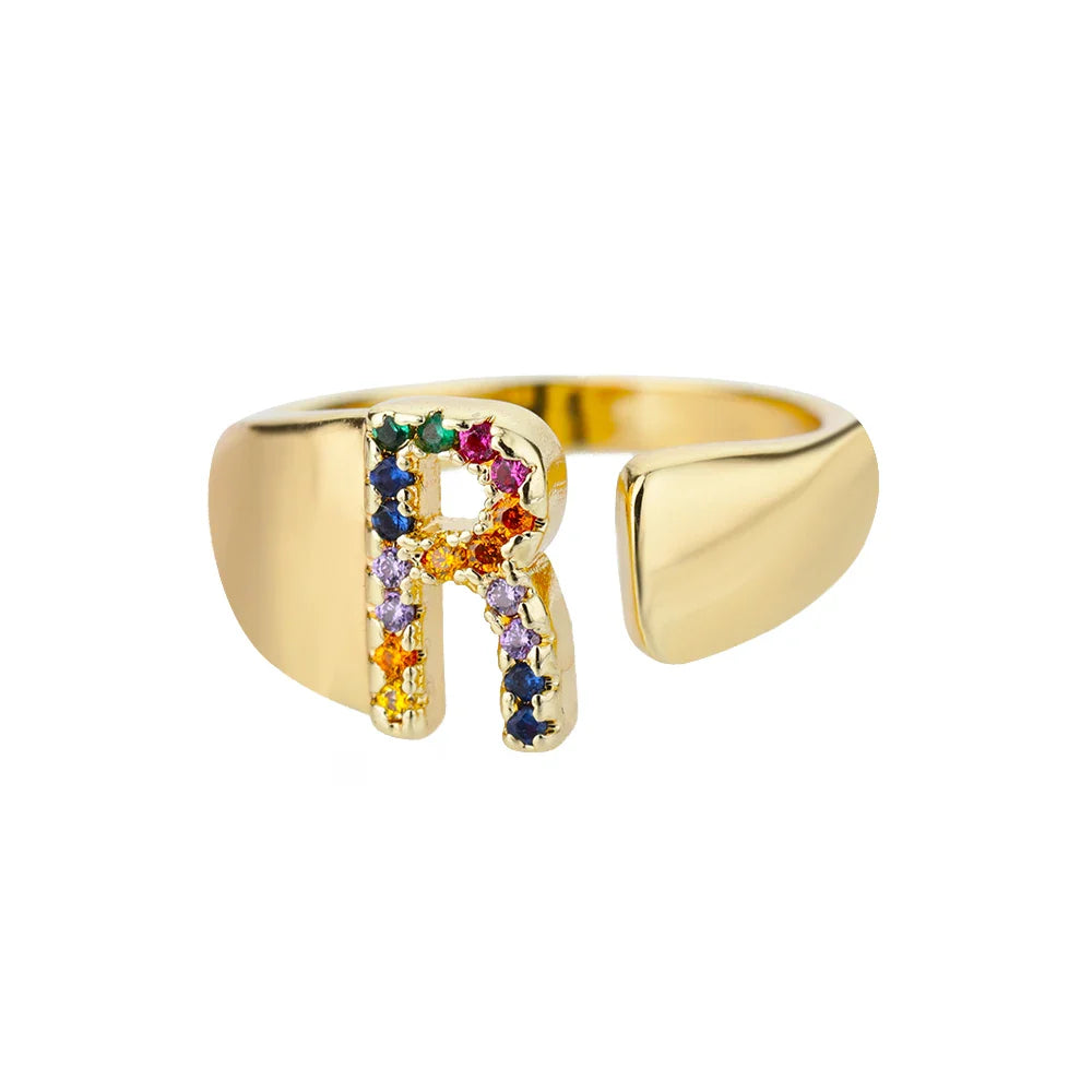 Brede gepersonaliseerde ring met regenbooginitiaal r