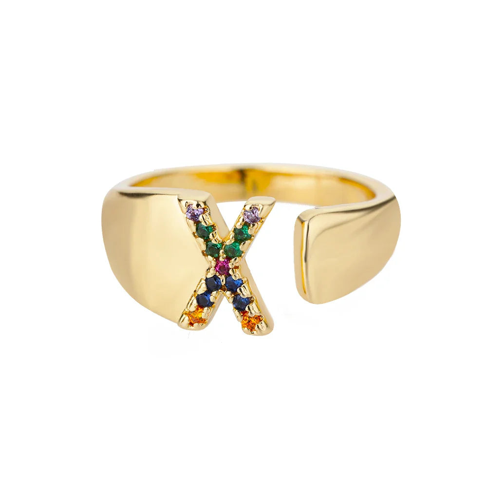 Brede gepersonaliseerde ring met regenbooginitiaal x