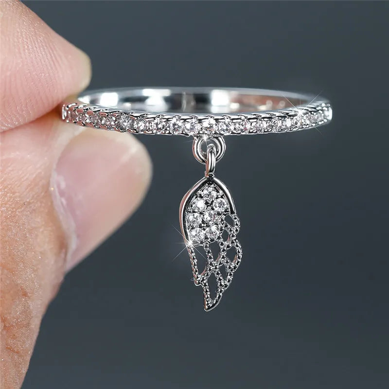 Ring met hanger in engelenvleugels van zilver