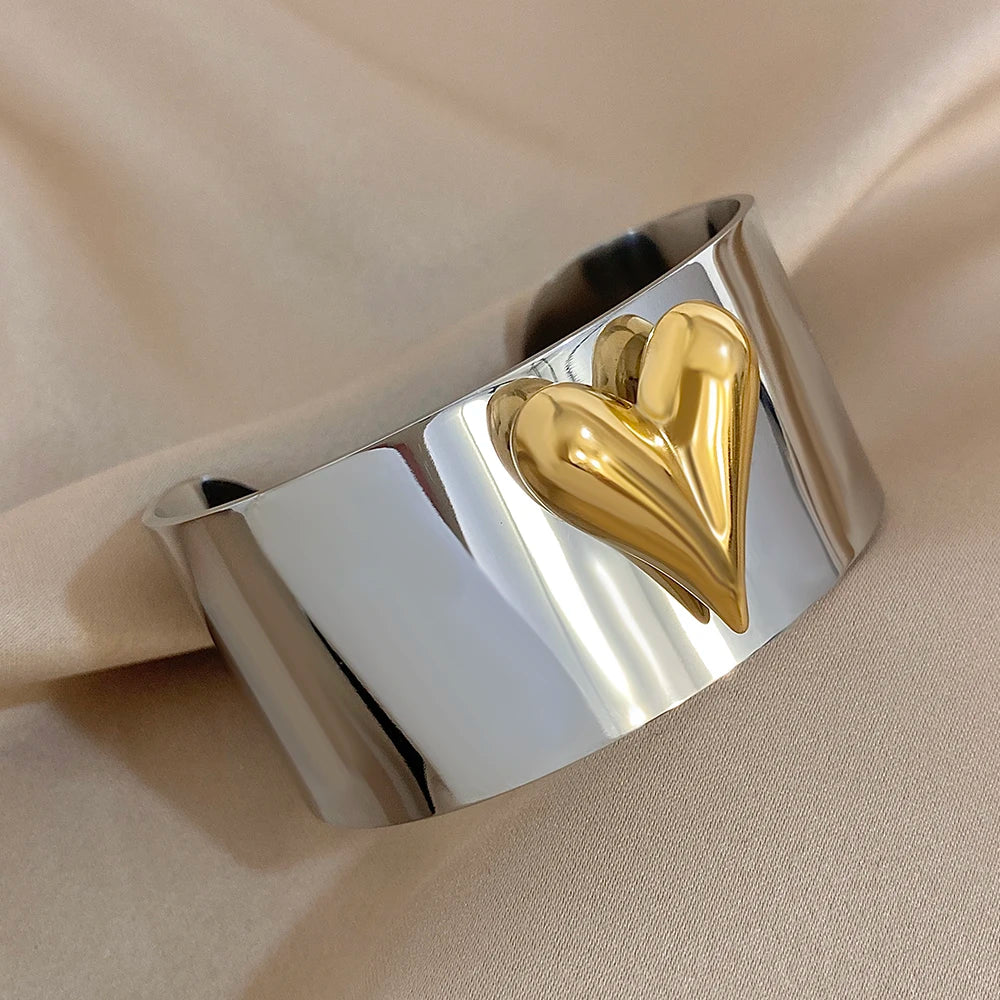 Hartvormige reliëfring goud