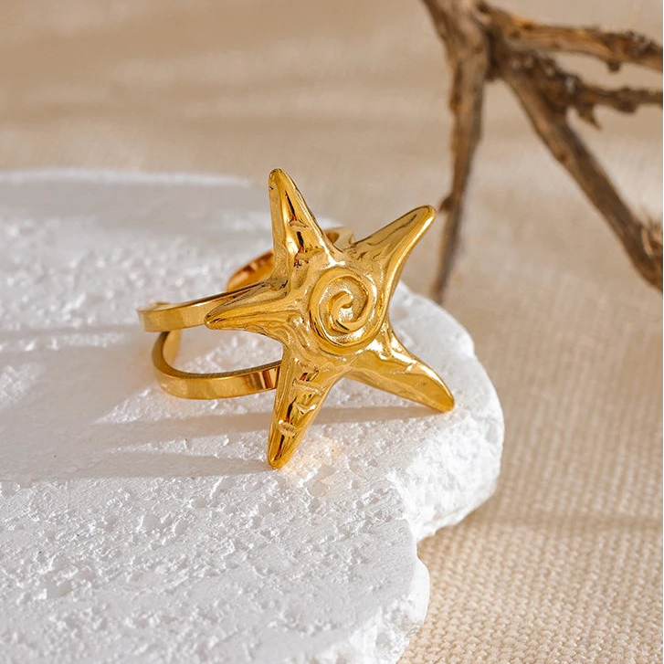 Gouden zeester schelpring voor dames
