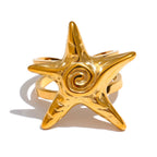 Gouden zeester schelpring voor dames