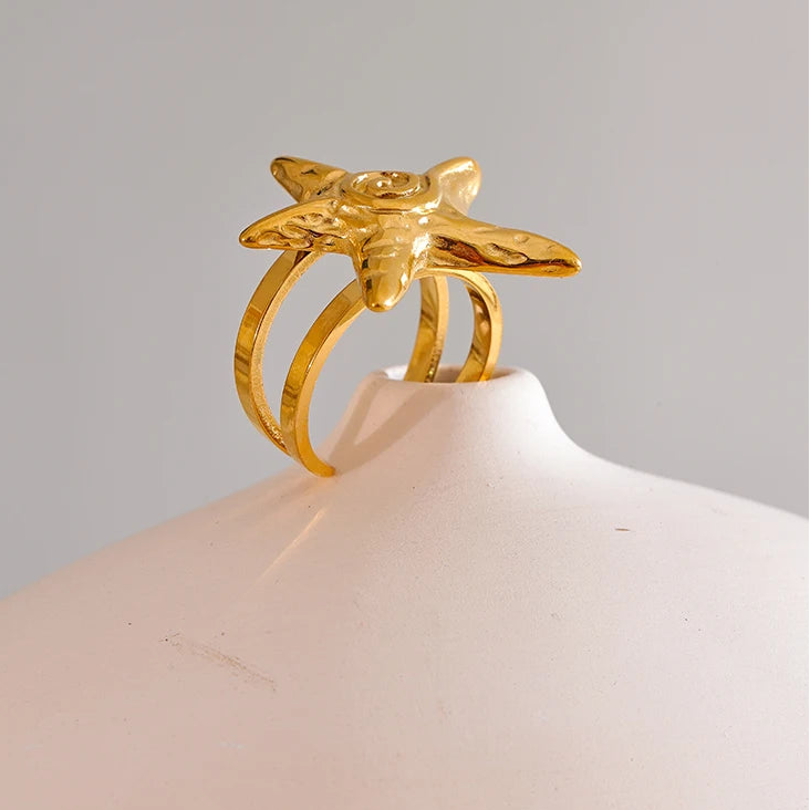 Gouden zeester schelpring voor dames