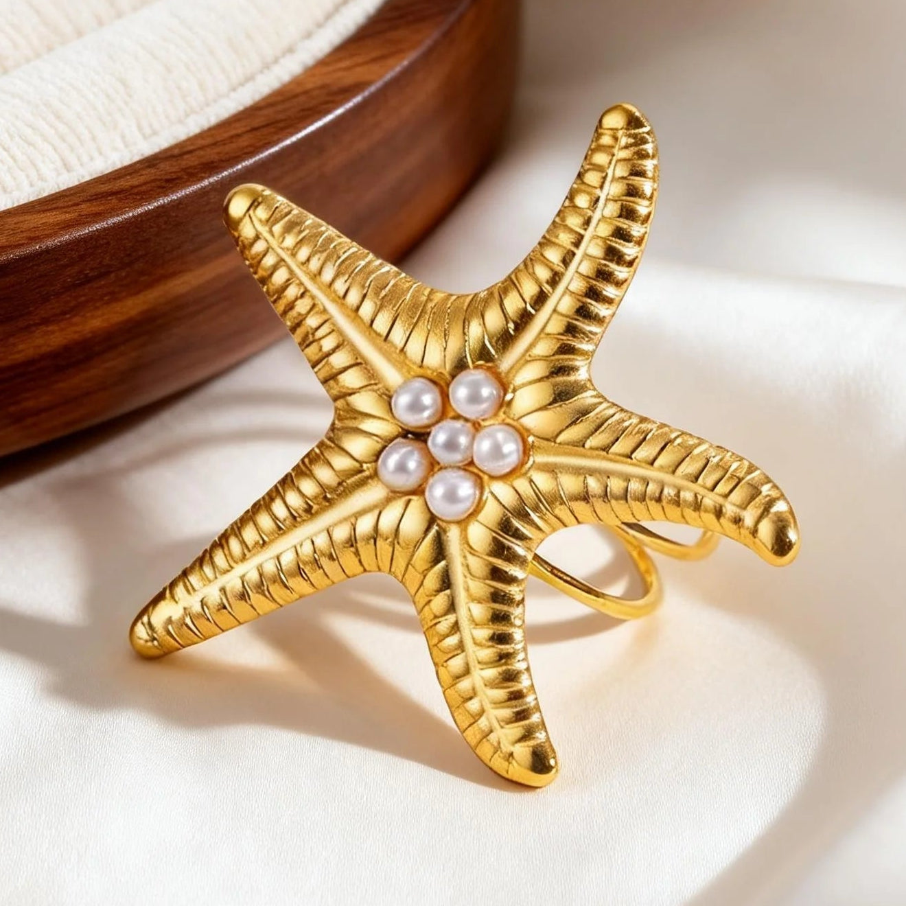 Gouden zeester schelpring