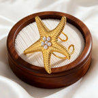 Gouden zeester schelpring