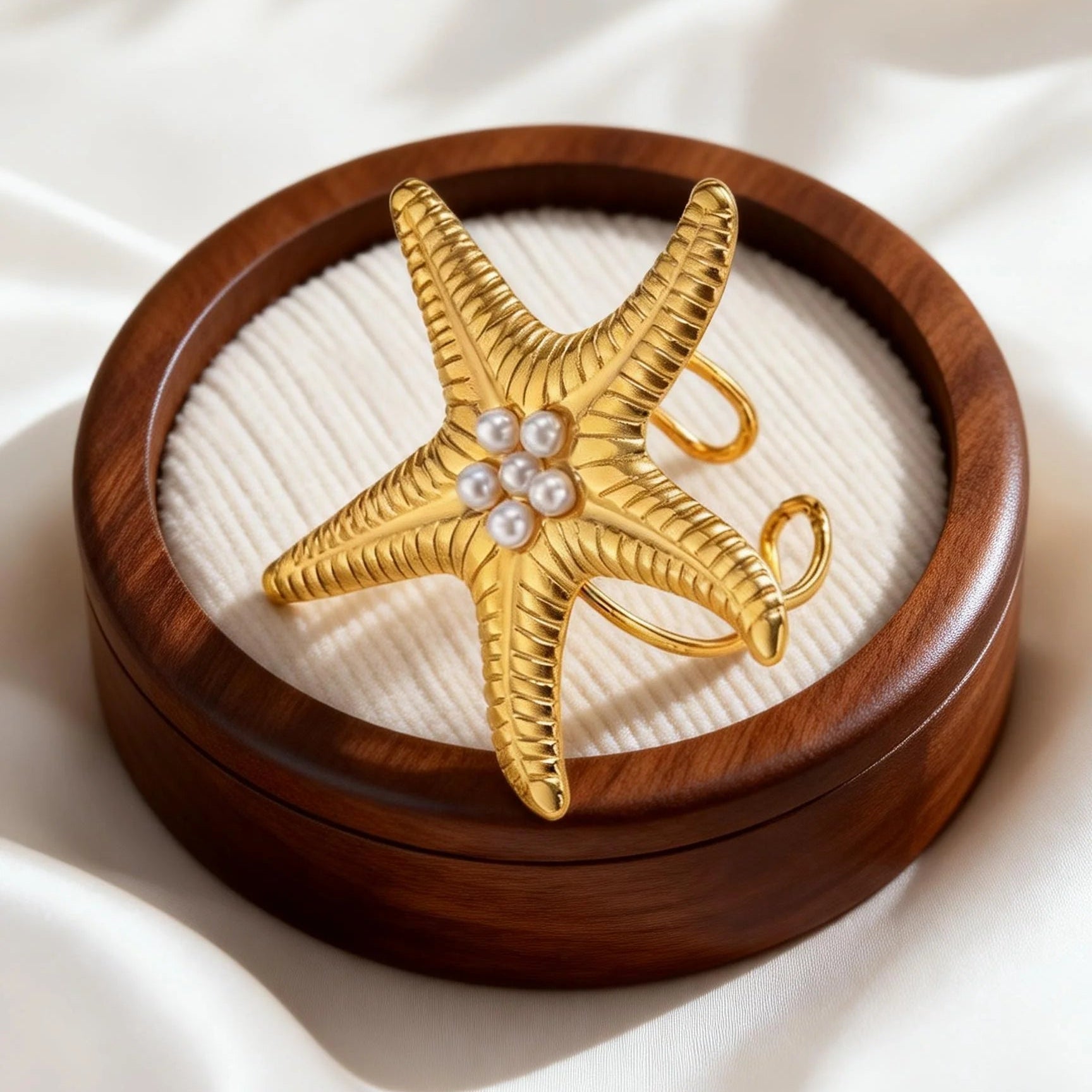 Gouden zeester schelpring