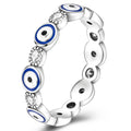 Beschermingsring met blauwe ooginleg en kristallen