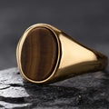 Goudkleurige ring met ovale tijgeroogsteen