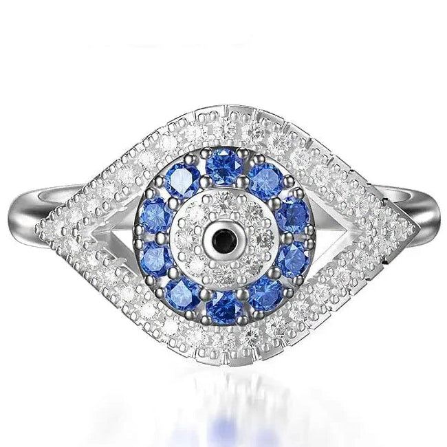Ring in de vorm van een oog bezet met kristallen en blauw oog