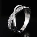 Oneindigheidsring met verstrengelde linten  zilver