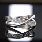 Oneindigheidsring met verstrengelde linten  zilver