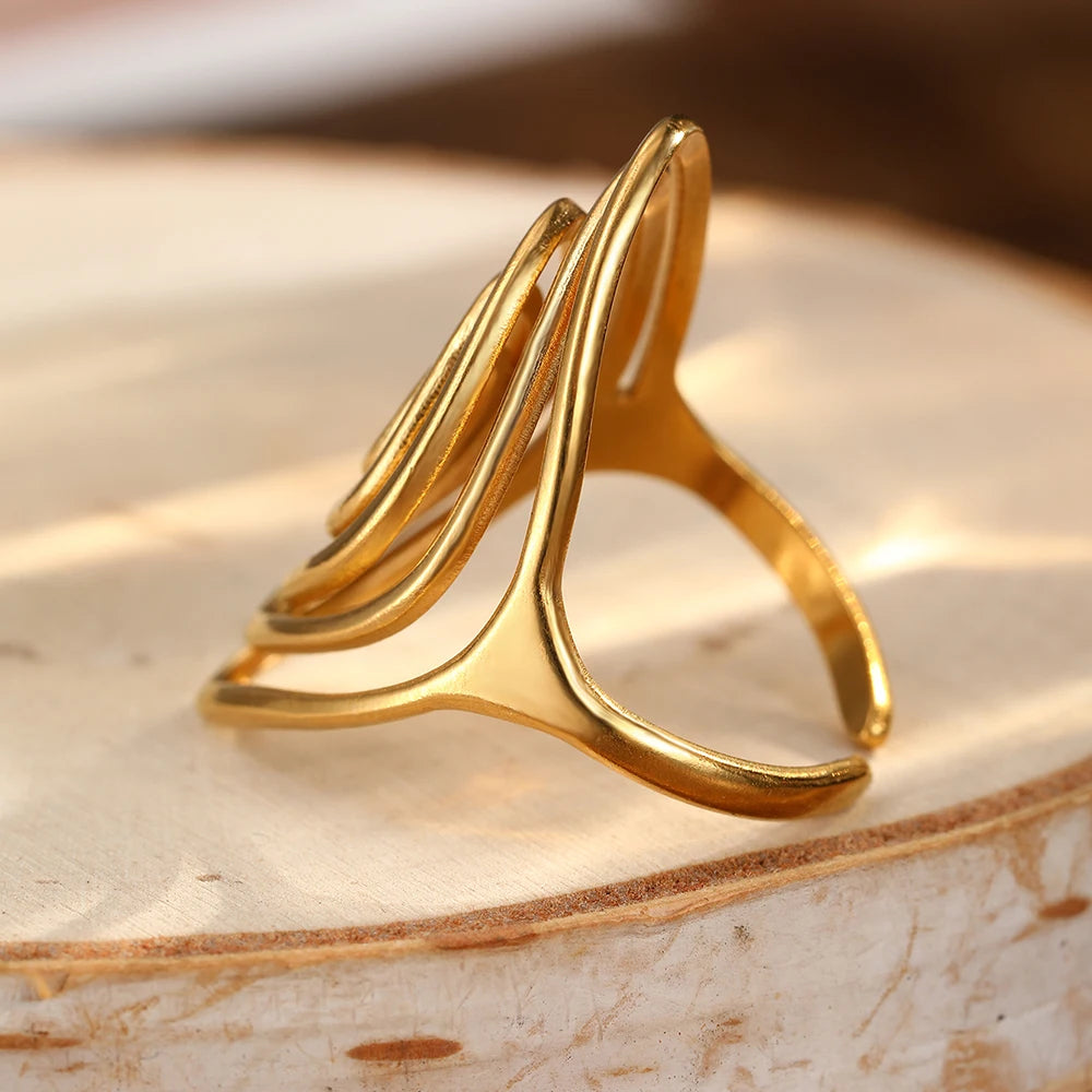 Brede ring in getextureerde spiraalvorm goud