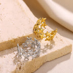 Brede ring met meerdere sterren goud