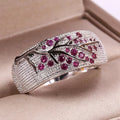 Brede ring bezet met kristallen levensboom