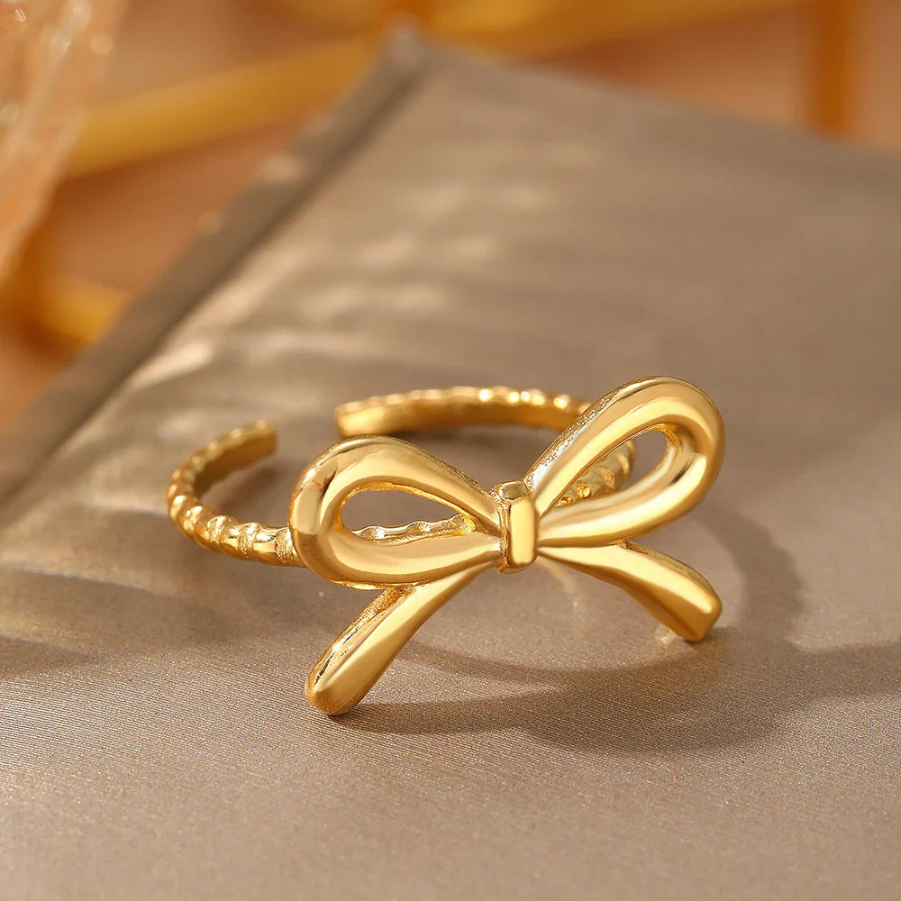 Vlinderdasring voor dames goud
