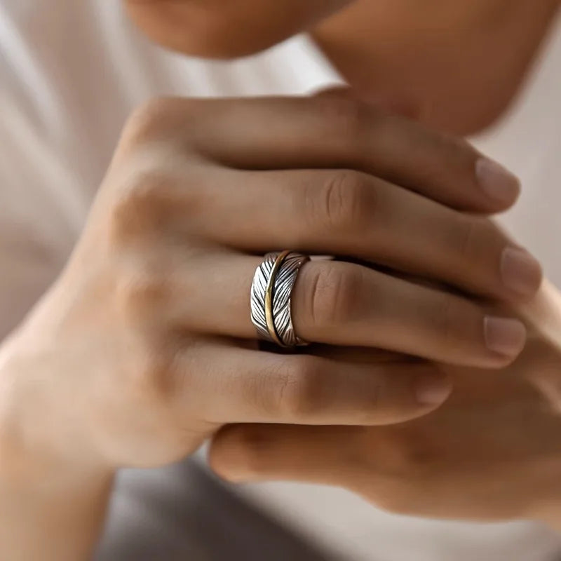 Open ring in de vorm van een veer