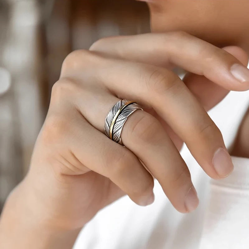 Open ring in de vorm van een veer