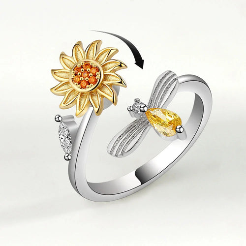 Ring met draaiende bij en bloem