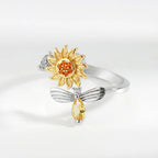 Ring met draaiende bij en bloem