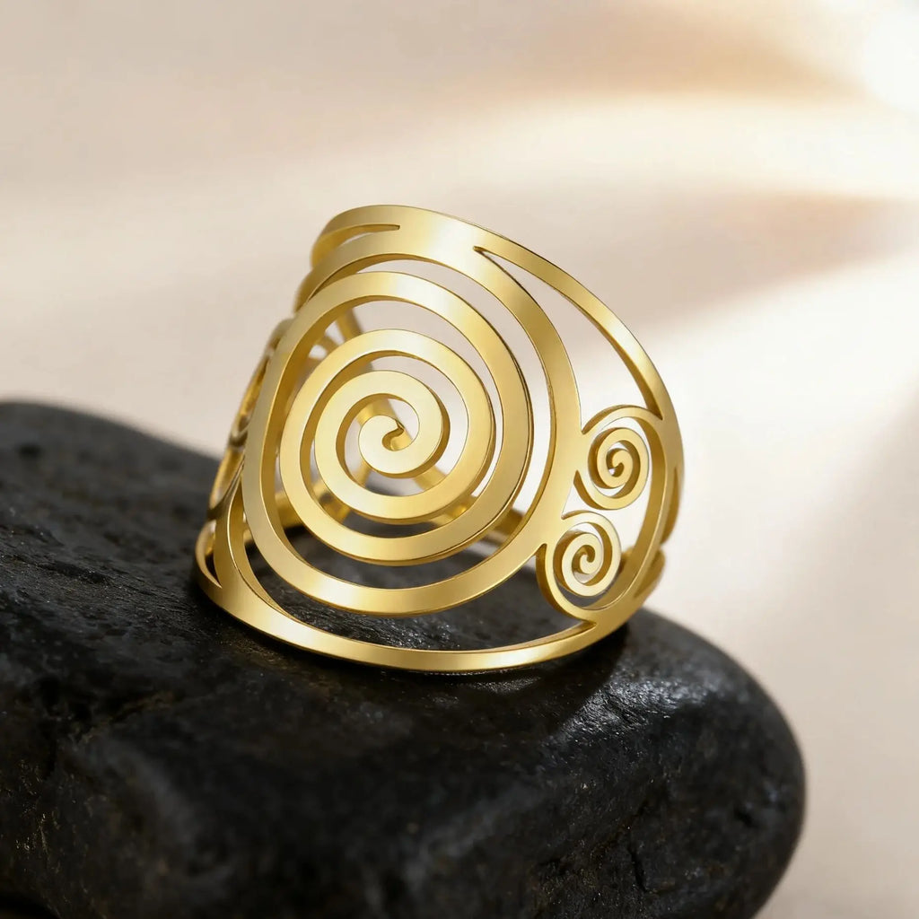 Brede spiraalring voor dames goud