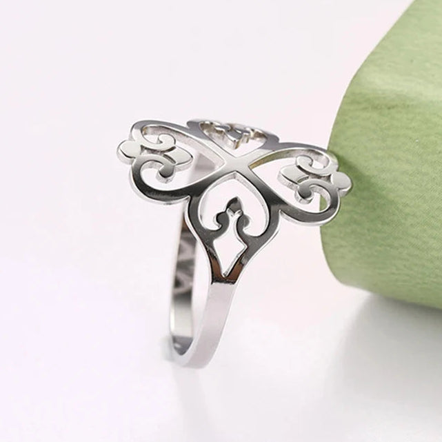 Opengewerkte ring met klaver van vier harten zilver