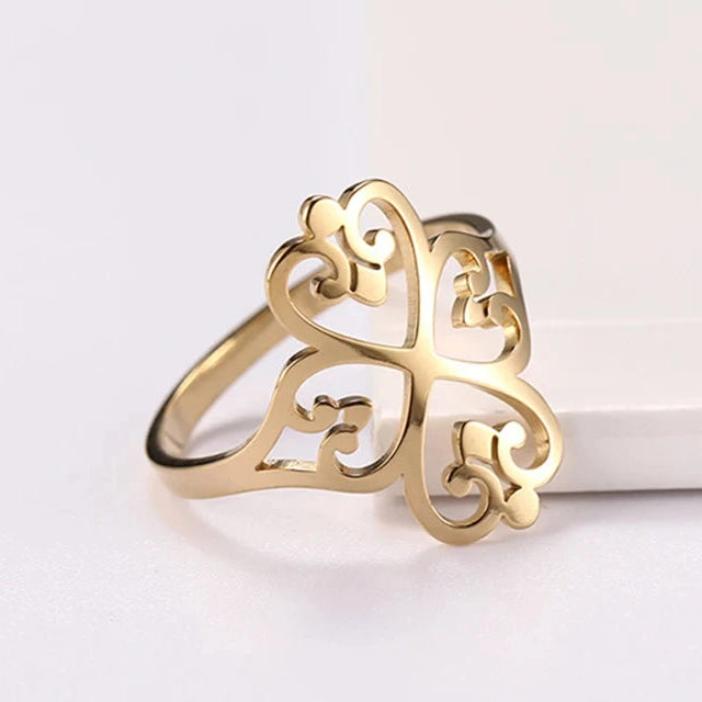Opengewerkte ring met klaver van vier harten goud