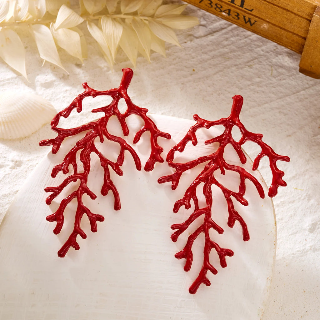Oorbellen met rode koraaltak