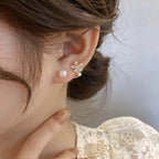 Boucles d'Oreilles Clou avec Fleur en Zircon et Perle