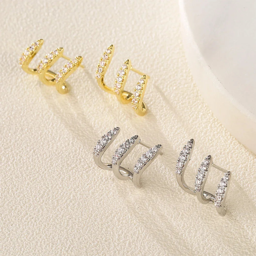 Elegante oorbellen met drieklauw strass 