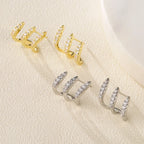 Elegante oorbellen met drieklauw strass 