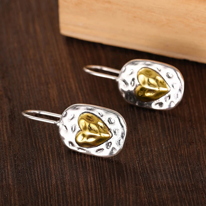 Boucles d'oreilles en cœur couleur argent et or