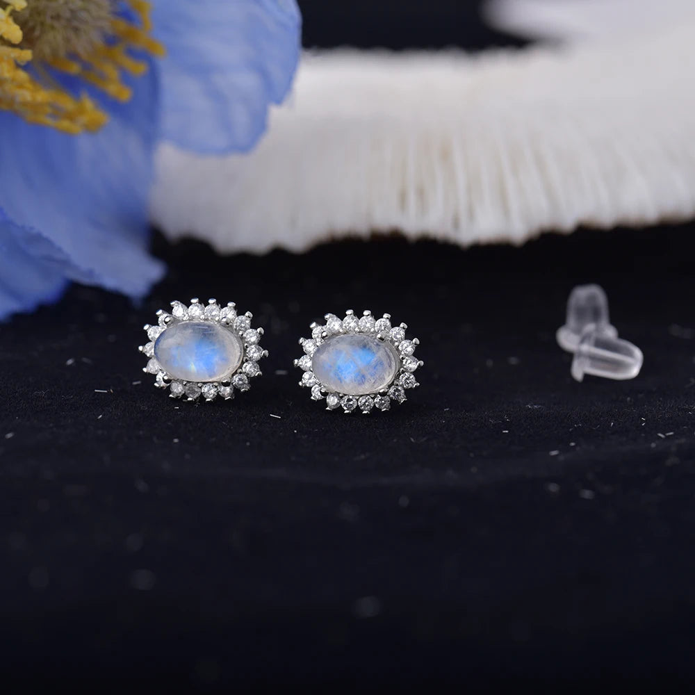 Oorbellen met maanstenen met bloemeneffect