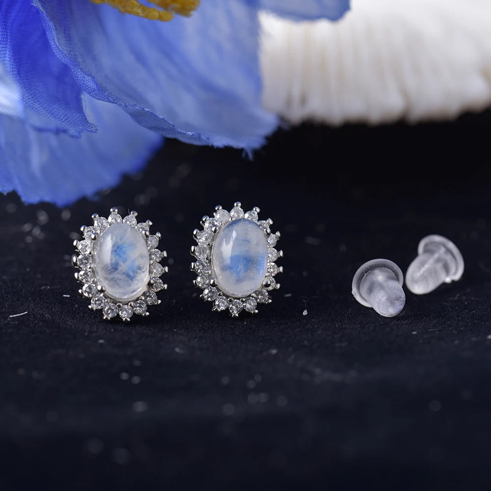 Oorbellen met maanstenen met bloemeneffect